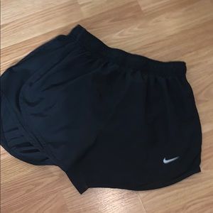 BLACK NIKE TEMPO SHORTS with silver Nike emblem